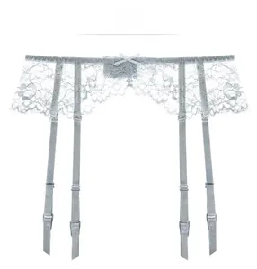 Gray lace garter belt detail with delicate bow and adjustable straps on white background