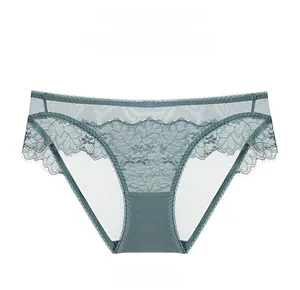 Close-up of blue lace underwear featuring floral embroidery and eyelash lace trim