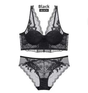 Detail of black floral lace lingerie set featuring underwired bra and matching panty