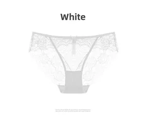 Detailed view of white floral lace panties with sheer mesh and a small bow detail