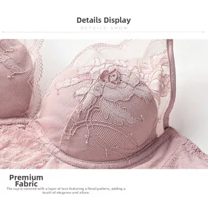 Detailed close-up of light pink floral lace embroidery on breathable mesh bra cups