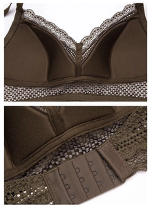 Detailed close-up of dark olive lace bra showing delicate embroidery and back hook closure