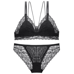 Two-piece black lace lingerie set with wireless triangle cup bra and matching panties