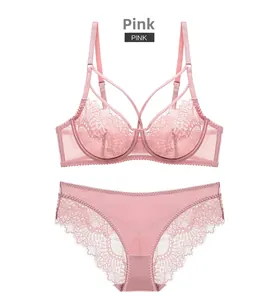 Detailed flat lay of pink floral lace lingerie set with underwire bra and matching panties