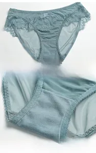 Detail of Morandi green lace panties with fine mesh texture and cotton crotch lining