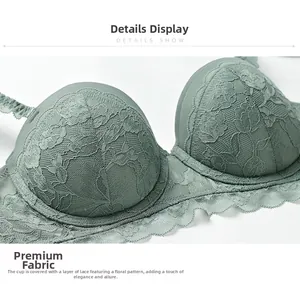 Detailed view of sage green lace bra featuring intricate floral patterns and scalloped edges