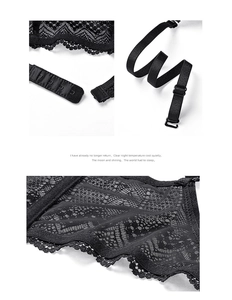 Detail showing four-row back hook closure and adjustable lace straps on black bra
