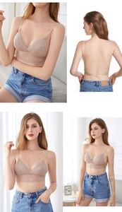 Detail of beige triangle lace bra with U-shaped low back design and floral embroidery