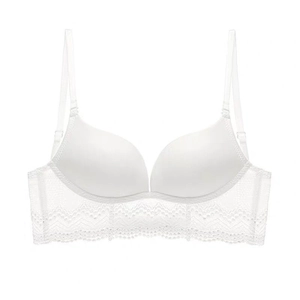 Elegant white seamless push-up bra with delicate lace band and adjustable straps