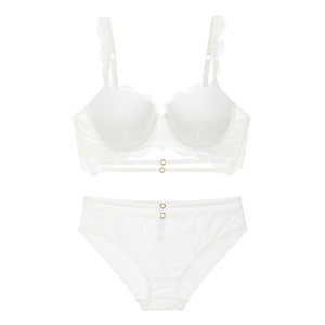 Detailed view of white floral lace lingerie set with metal rings and eyelash lace trim