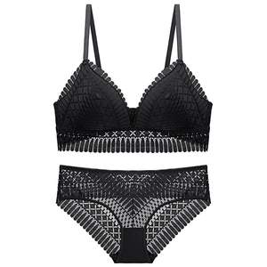Elegant black lace lingerie set featuring a wireless triangle bra and matching panties