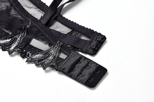 Detail of black lace bra with cherry embroidery and double row hook-and-eye back closure