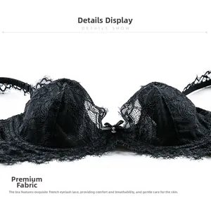 Detail view of black French eyelash lace bra with bow accent and sheer cup texture
