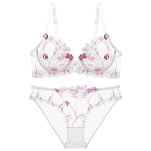 White sheer lace lingerie set with elegant floral embroidery and adjustable straps