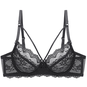 Sexy black lace unlined bra with floral embroidery and criss-cross straps on white backdrop