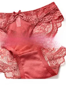 Détail de dentelle rouge avec nœud en satin et doublure intérieure 100% coton doux