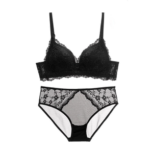 Detailed view of the black lace bra and panty set with delicate floral embroidery