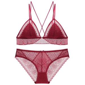 Detailed view of burgundy lace lingerie set with floral mesh and front clasp