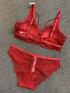 Detailed view of red floral lace lingerie set with embroidered bra and matching panty