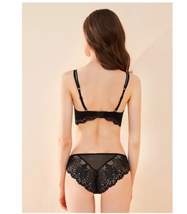 Rear view of elegant black lace lingerie set featuring intricate floral embroidery details