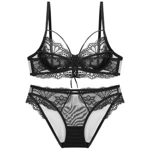 Sexy black lace lingerie set with floral patterns and sheer details for women