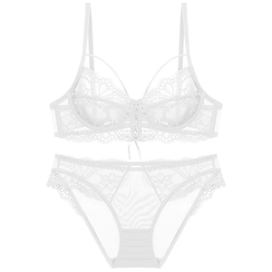 Detailed view of white lace lingerie set featuring sheer floral patterns and delicate ribbons