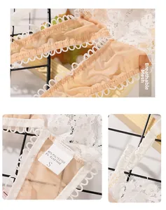 Detail of white floral lace, breathable mesh fabric and garment care label on a S bra
