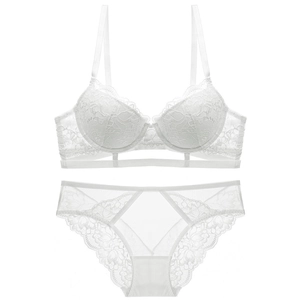Detailed view of white lace push-up bra set with intricate floral patterns and mesh detail