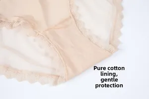 Detail view of the soft cotton crotch lining and delicate lace trim on beige underwear