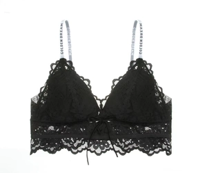 Dettaglio del reggiseno in pizzo nero con bordi a conchiglia e spalline Golden Dream