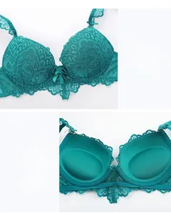 Detail of forest green lace bra with floral embroidery and push-up padded cups