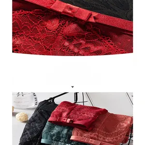 Detailed macro view of sheer floral lace panties with breathable cotton crotch and bows