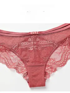 Close-up of dark pink sheer lace panties featuring fine mesh details and a delicate bow