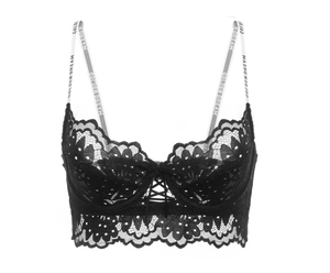 Close-up of black floral lace bra with Golden Dream lettered straps and cross detail