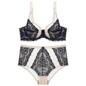 Lace lingerie set with beige base and black floral lace, underwire bra and high waist panties
