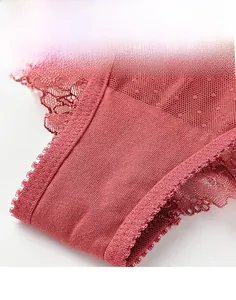 Close-up of breathable cotton crotch and floral hollow lace on mauve sexy panties