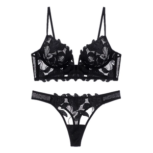 Detailed view of black floral embroidery lace and sheer mesh on the lingerie set