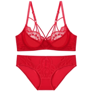 Detailed flat lay of red lace lingerie set with 1/2 cup bra and matching panties