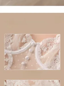 Detail of embroidered floral lace bra with round buttons and sheer mesh texture