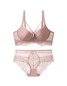 Détails macro d'un ensemble soutien-gorge et culotte en dentelle rose élégante