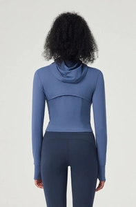 Slim fit hooded yoga jacket with back ventilation detail and thumb holes in mist blue