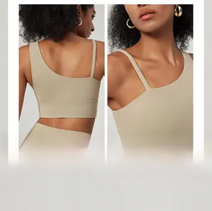 Detail view showing cool open back and raised side design of beige sports bra