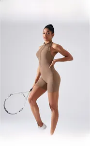 Detail of coffee brown sleeveless yoga bodysuit with high collar and front half-zipper