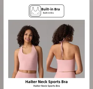 Detailed view of halter neck yoga sports bra with built-in pads and open back design