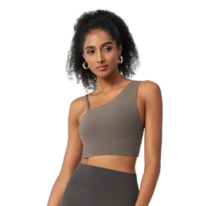 Asymmetrical one-shoulder sports bra in taupe with removable pads for yoga and fitness