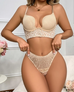 Detail of nude leopard print deep U-neck push-up bra and matching thong set