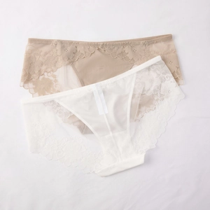 Set of two lace underwear in beige and white with floral embroidery and wavy edges