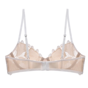 Nude French lace bra with floral embroidery and adjustable straps shown from back