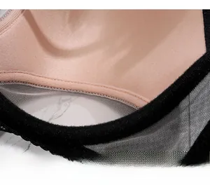 Detailed macro view of soft underwire support and breathable mesh lining of the lace bra