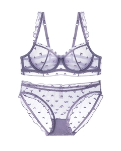 Detailed flat lay of lavender mesh bra and panty set with heart prints and ruffle trim